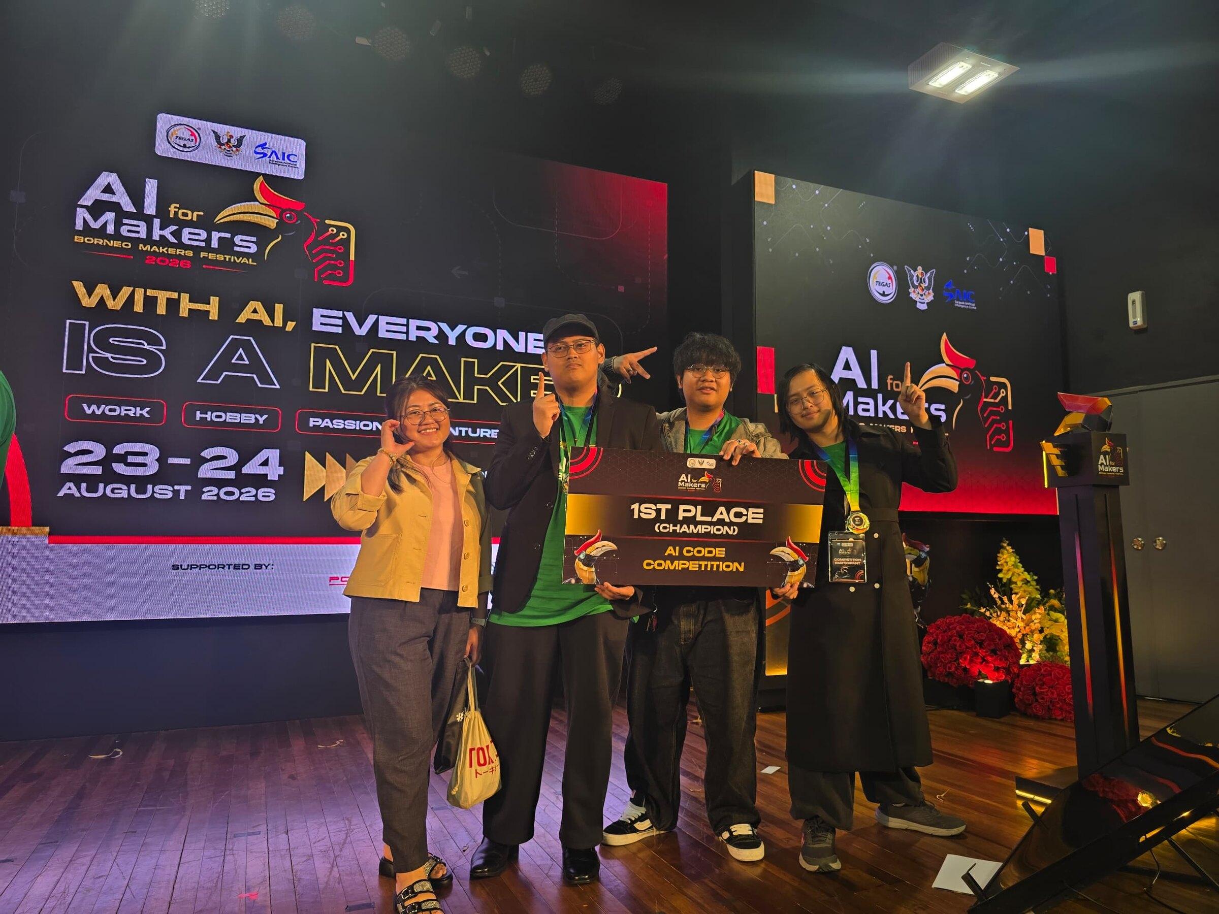 The team on the AI For Makers 2026 stage holding the 1st Place (Champion) AI Code Competition cheque